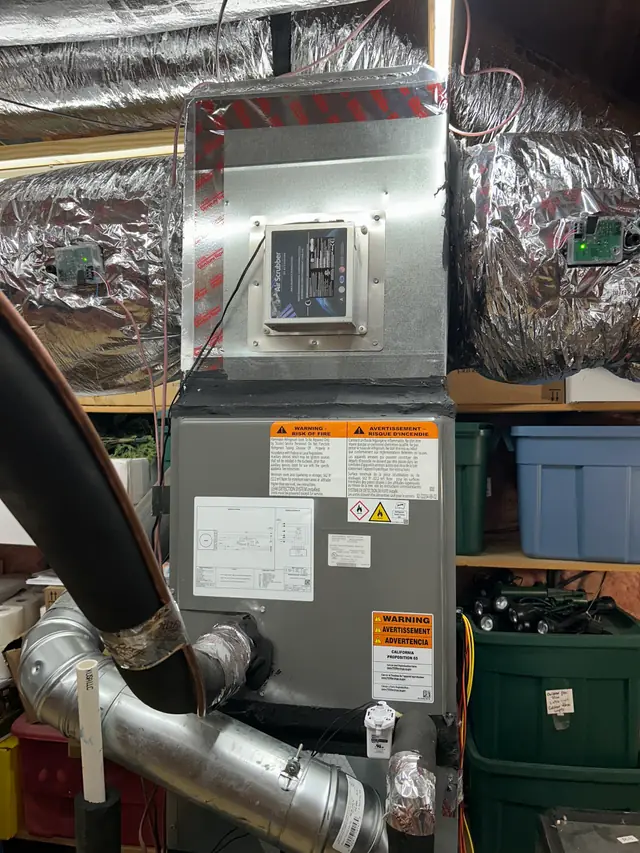 Air purification unit installed on the supply plenum above an air handler